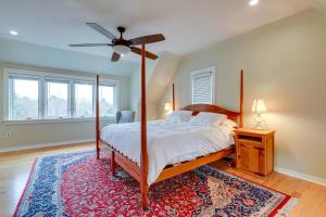 a bedroom with a bed and a ceiling fan at Expansive Wilmot Escape with Deck Near Skiing! in Wilmot