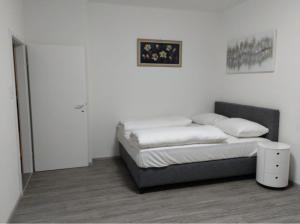 Ein Bett oder Betten in einem Zimmer der Unterkunft Appartment salzburg city center