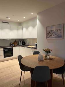 Dapur atau dapur kecil di Ny leilighet i nytt bygg i naturskjønne omgivelser!