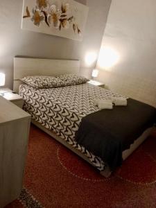 Ένα ή περισσότερα κρεβάτια σε δωμάτιο στο HOME ADRIANA