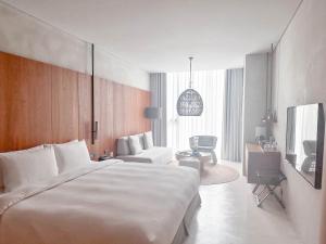 Postel nebo postele na pokoji v ubytování 了了礁溪 Vivir Jiaoxi Hotel + 37 fotografií