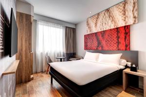 Postel nebo postele na pokoji v ubytování ibis PJCC Petaling Jaya