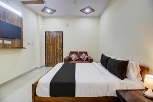 Кровать или кровати в номере Magnus Suites Luxury rooms