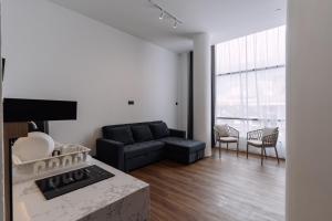 Posezení v ubytování Impiana by Roxy Hotel