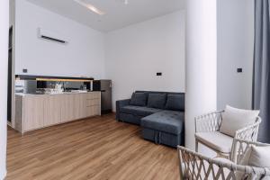 Posezení v ubytování Impiana by Roxy Hotel