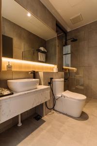 Koupelna v ubytování Impiana by Roxy Hotel