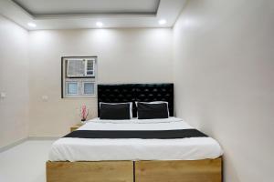 מיטה או מיטות בחדר ב-Flagship The Bed Box