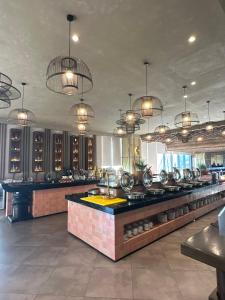 a bar in a restaurant with many lights at Apec Phú Yên SeaView Condotel in Tuy Hoa