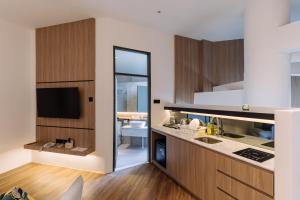 Kuchyň nebo kuchyňský kout v ubytování Impiana by Roxy Hotel