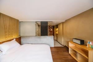 Hangzhou XianQingShan Homestay Westlake客房内的一张或多张床位