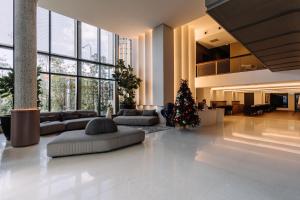 Posezení v ubytování Impiana by Roxy Hotel