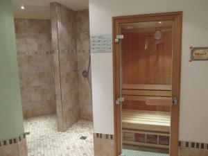 Ein Badezimmer in der Unterkunft Hotel Apart Alpenschlössl