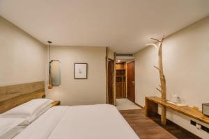 Hangzhou XianQingShan Homestay Westlake客房内的一张或多张床位