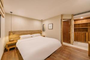 Hangzhou XianQingShan Homestay Westlake客房内的一张或多张床位