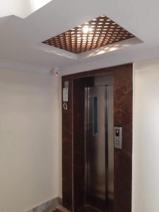 a elevator in a room with a ceiling at Grand Yak Boutique Hotel in Kathmandu