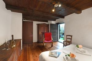 Posezení v ubytování Chalet Rustico Al Platano