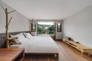 Postel nebo postele na pokoji v ubytování Hangzhou XianQingShan Homestay Westlake