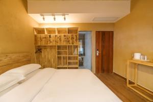 Hangzhou XianQingShan Homestay Westlake客房内的一张或多张床位