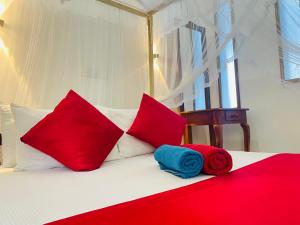 A bed or beds in a room at Cinnamon City