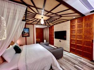 TV a/nebo společenská místnost v ubytování AURORA MOTEL