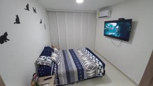 Postel nebo postele na pokoji v ubytování Apartamento en Ricaurte para descansar y disfrutar