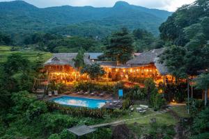 an aerial view of a resort with a swimming pool at Puluong Valley Home in Pu Luong