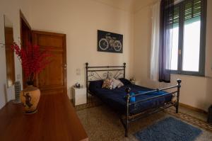 Ένα ή περισσότερα κρεβάτια σε δωμάτιο στο Bonanno Street Tower free parking