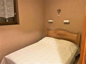 Ένα ή περισσότερα κρεβάτια σε δωμάτιο στο Appartement Le Monêtier-les-Bains, 2 pièces, 4 personnes - FR-1-330F-225