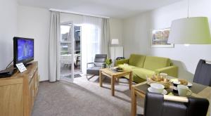 Televisyen dan/atau pusat hiburan di Apartmenthaus Holländerei