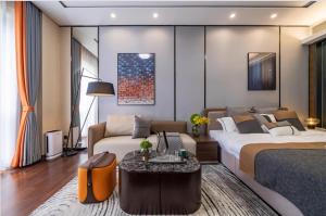 Katil atau katil-katil dalam bilik di Millenia Executive Apartment Guangzhou East Railway Station Zhujiang New Town Branch - Free Shuttle Bus to Canton Fair Complex During Canton Fair Period