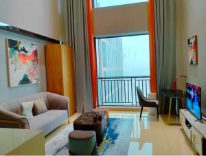 TV i/ili zabavni centar u objektu Millenia Executive Apartment Guangzhou East Railway Station Zhujiang New Town Branch - Free Shuttle Bus to Canton Fair Complex During Canton Fair Period