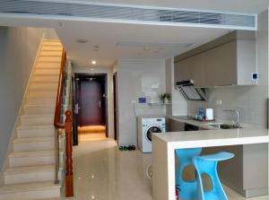 Dapur atau dapur kecil di Millenia Executive Apartment Guangzhou East Railway Station Zhujiang New Town Branch - Free Shuttle Bus to Canton Fair Complex During Canton Fair Period +15 gambar