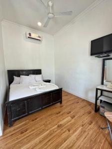 TV a/nebo společenská místnost v ubytování Sunrise Villas