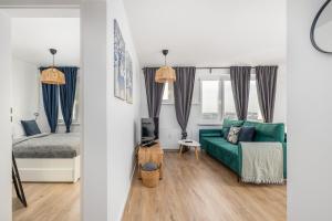 Posteľ alebo postele v izbe v ubytovaní Apartment Near the Warta River by Noclegi Renters