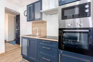 Η κουζίνα ή μικρή κουζίνα στο Maison spacieuse proche Lille +16 φωτογραφίες