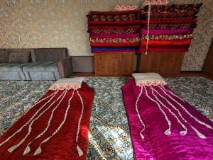 Lova arba lovos apgyvendinimo įstaigoje Guest house Muslim