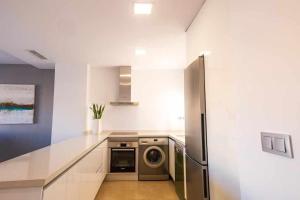 Kuchyň nebo kuchyňský kout v ubytování Apartamento Capri IV Vistabella golf