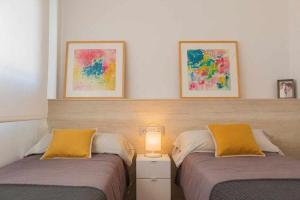 Postel nebo postele na pokoji v ubytování Apartamento Capri IV Vistabella golf