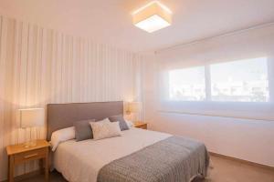 Postel nebo postele na pokoji v ubytování Apartamento Capri IV Vistabella golf + 17 fotografií