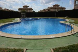 Basen w obiekcie Relax Family home Zenia bulevard lub w pobliżu
