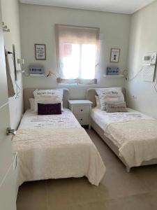 Postel nebo postele na pokoji v ubytování Duplex campoamor heated pool