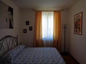 Postel nebo postele na pokoji v ubytování B&B Casa Perini