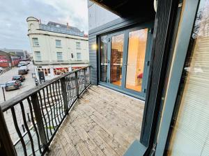 a balcony of a building with a view of a street at Riverside Apartment with balcony in Bristol