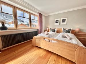 Ένα ή περισσότερα κρεβάτια σε δωμάτιο στο Haus Wallis by stayFritz - Ski-In Ski-Out Zimmer 'garni' am Arlberg