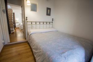 Posteľ alebo postele v izbe v ubytovaní EL CUARTO LA GITANA