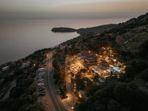 una vista aérea de una ciudad junto al agua en Aegean Castle Andros – Adults Only, en Agia Eleousa