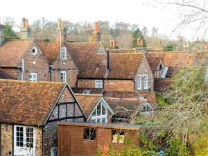 a group of houses with roofs at Pass the Keys Converted Hop House Apt - Old Amersham - Chilterns in Amersham