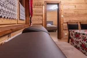 Postel nebo postele na pokoji v ubytování Tylicki Stary Dom