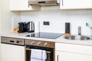 Η κουζίνα ή μικρή κουζίνα στο MyFlat - Bright Apartment near Central Station
