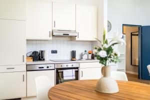 Η κουζίνα ή μικρή κουζίνα στο MyFlat - Bright Apartment near Central Station